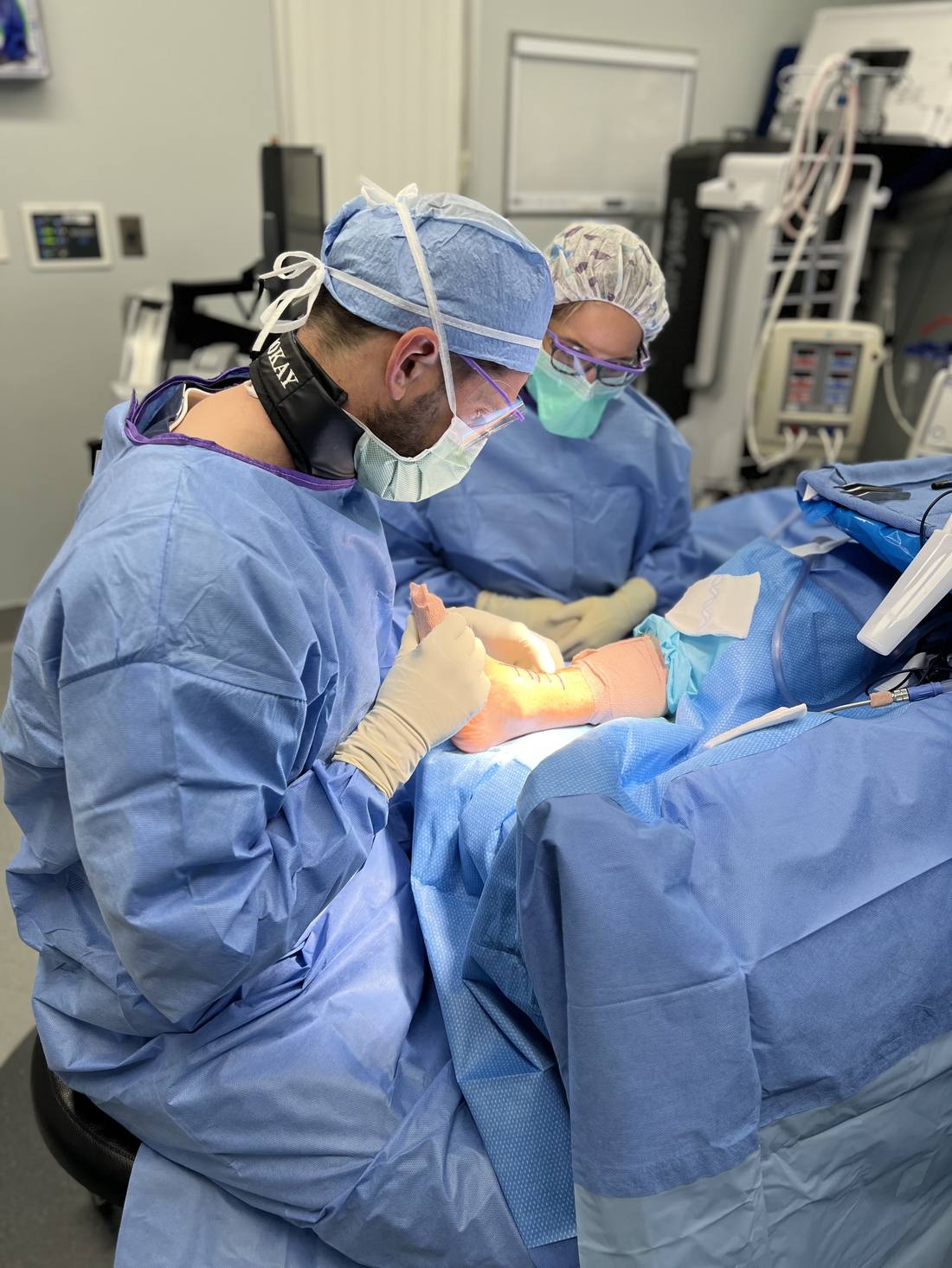 Dr. Ben McGrath performing minimally invasive bunion surgery